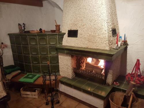 Oven with open fireplace